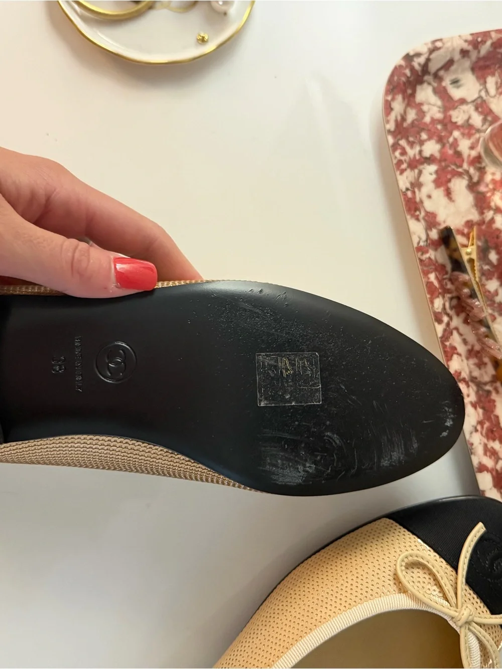 CHANEL Beige and Black Cap-Toe Ballet Flats with Bow